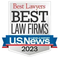 A badge that says best lawyers best law firms